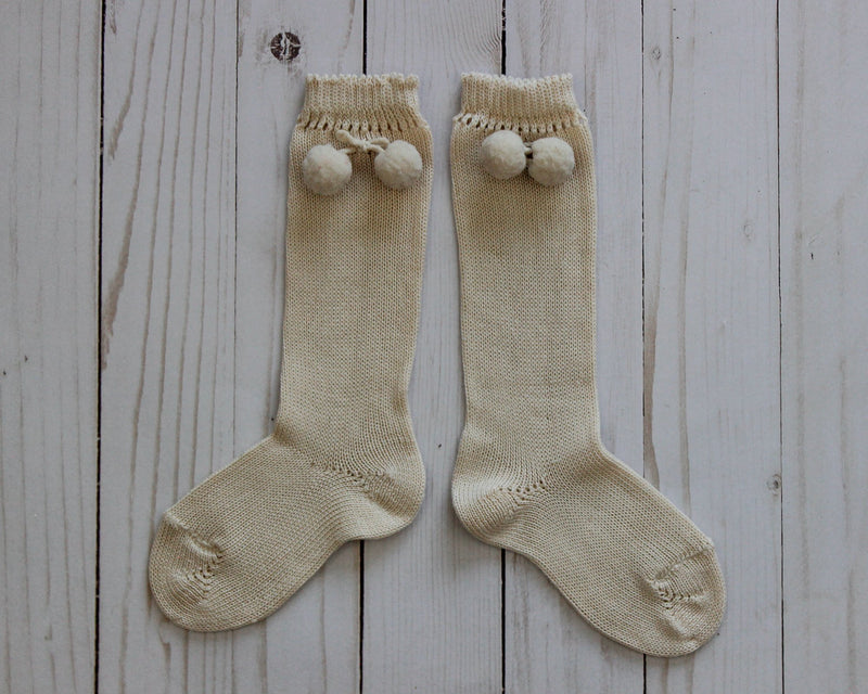 Traditional baby socks  with pompom design