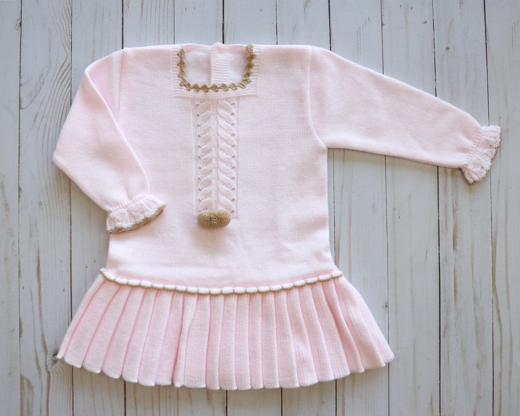 Knitted girls dress with pleated skirt
