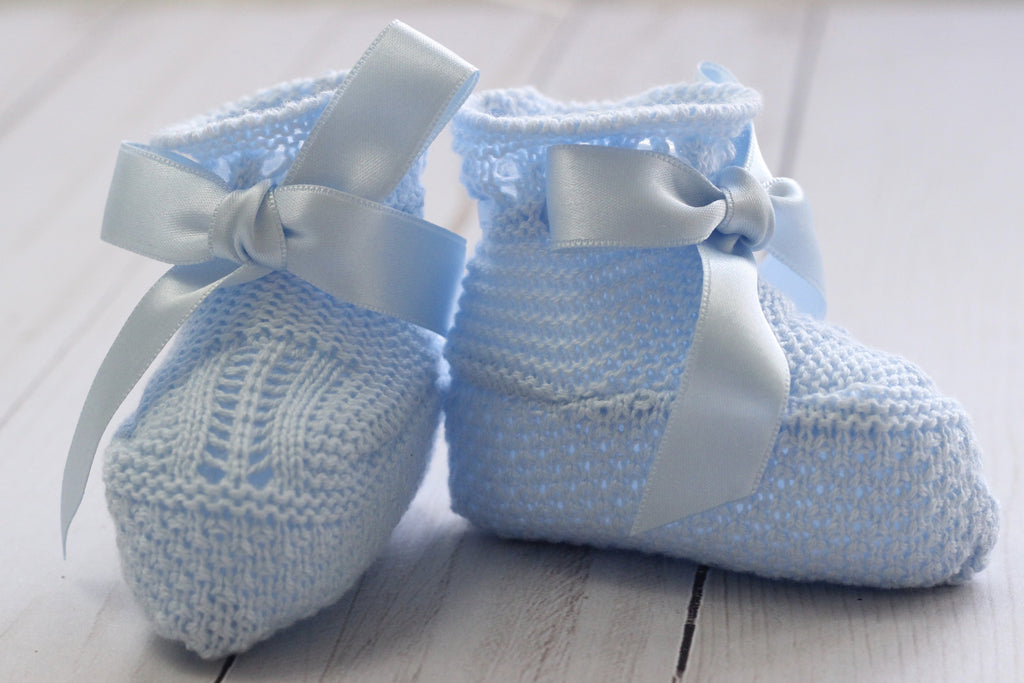 Traditional knitted baby booties. Hand made in Spain