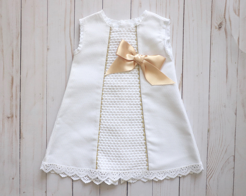 Baby dress with lace and bow