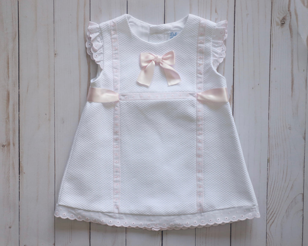 Pique dress with cotton lace and bow